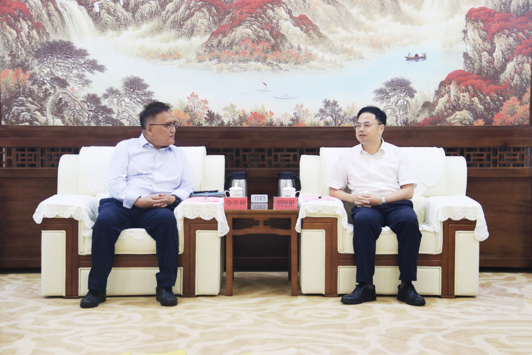 胡旭彬会见东软集团轮值首席执行官徐洪利一行